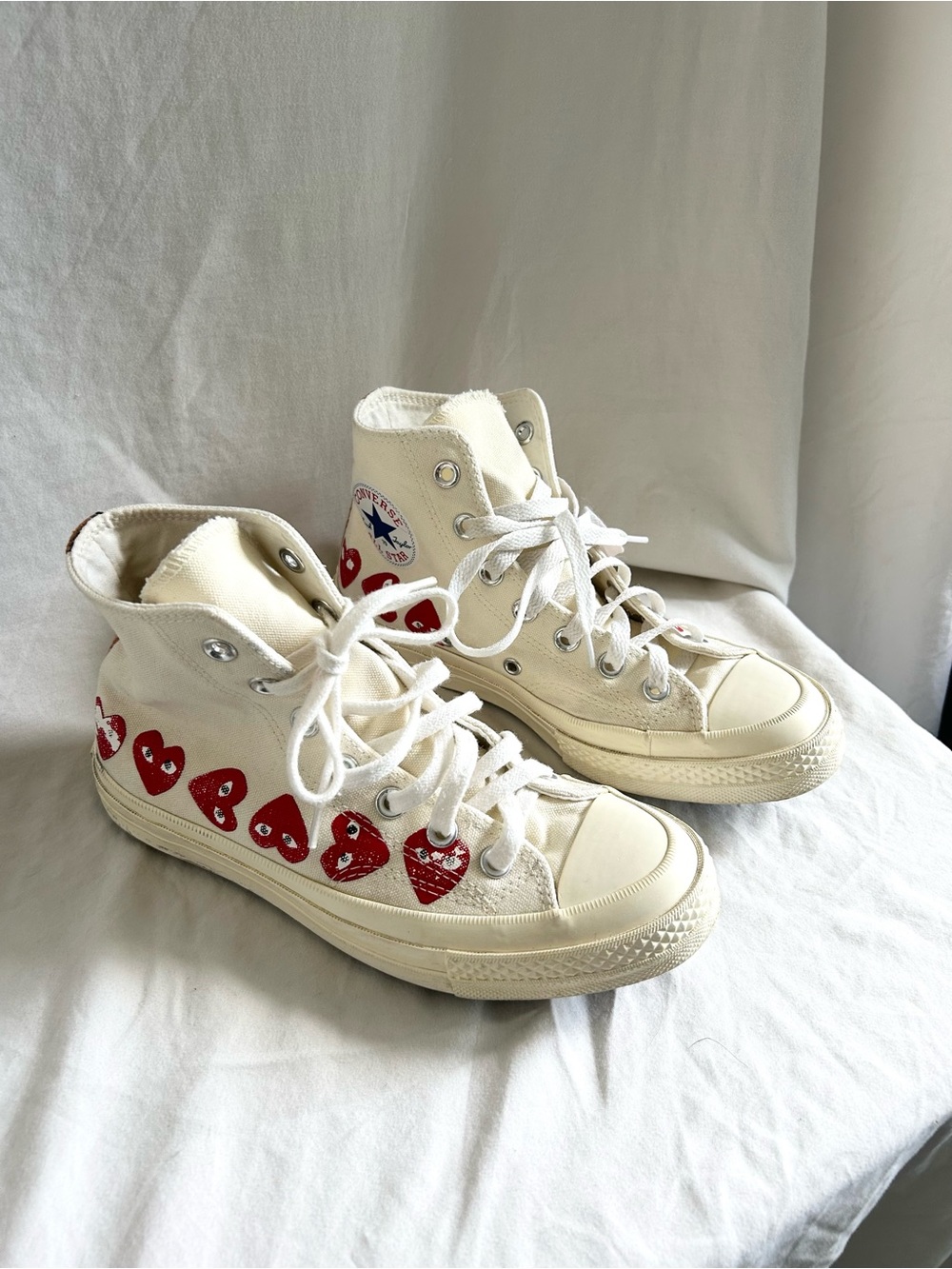 Converse White High-Top Sneakers with Red Heart Motif